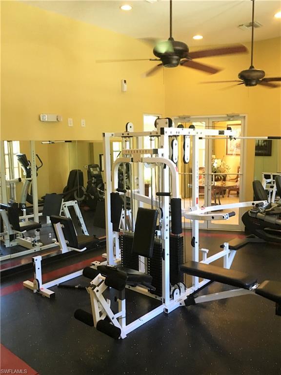 4530 Botanical Pl Circle, Unit 206 Naples, FL 34112 - Photo 23 of 25 a view of a room with gym equipment