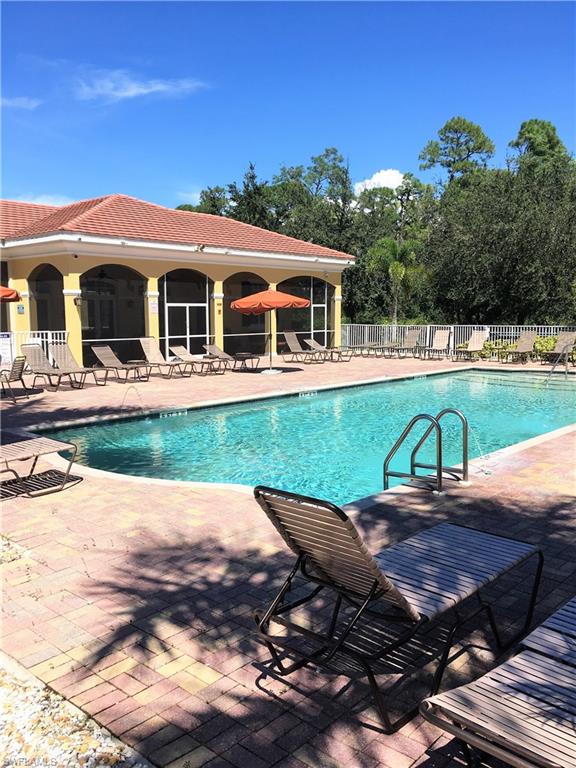 4530 Botanical Pl Circle, Unit 206 Naples, FL 34112 - Photo 24 of 25 a view of a house with garden