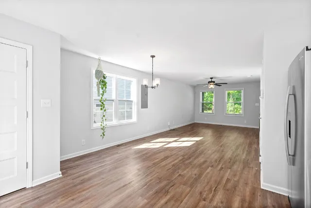 a view of livingroom with hardwood floor and window