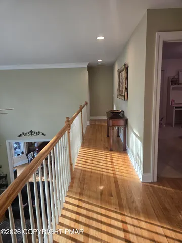 a bedroom with two bunk beds and a baby crib