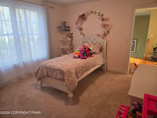 a view of a hallway to other room