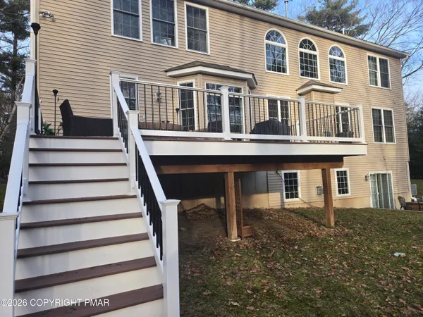 a front view of a house with a porch