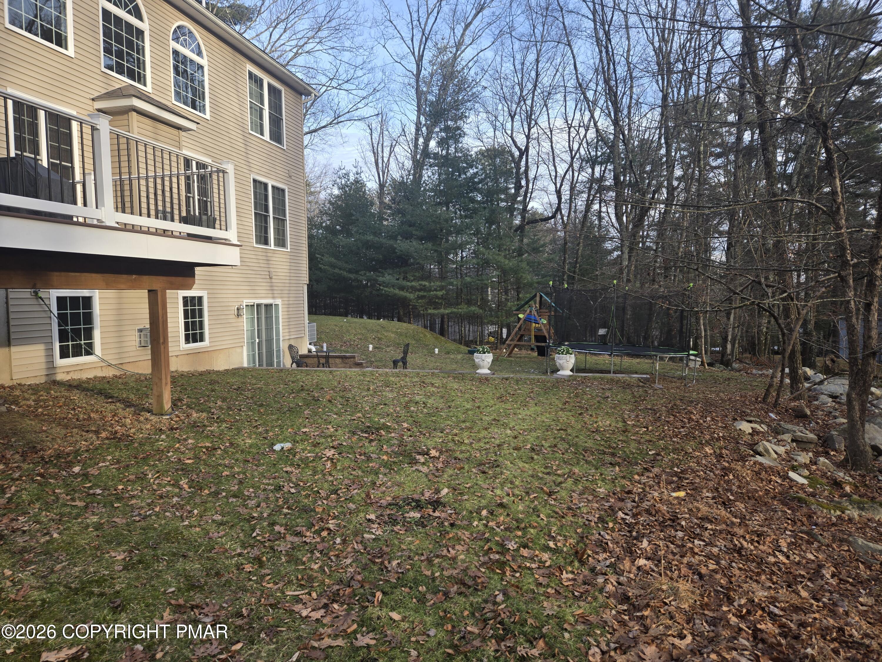 110 Crocus Lane Milford, PA 18337 - Photo 3 of 35 a backyard of a house with lots of green space