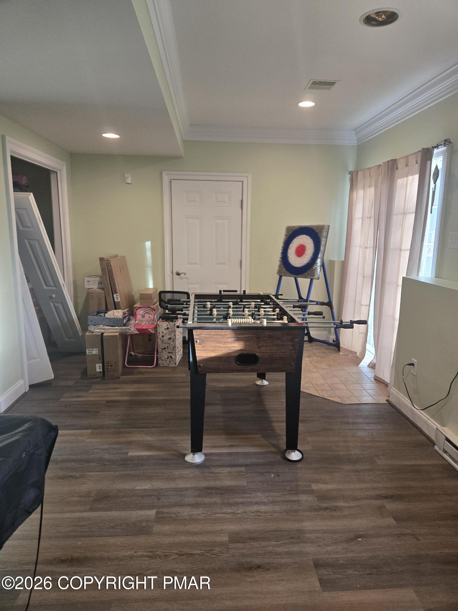 110 Crocus Lane Milford, PA 18337 - Photo 33 of 35 a living room with furniture and a wooden floor