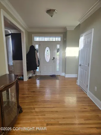 a view of livingroom with furniture and wooden floor
