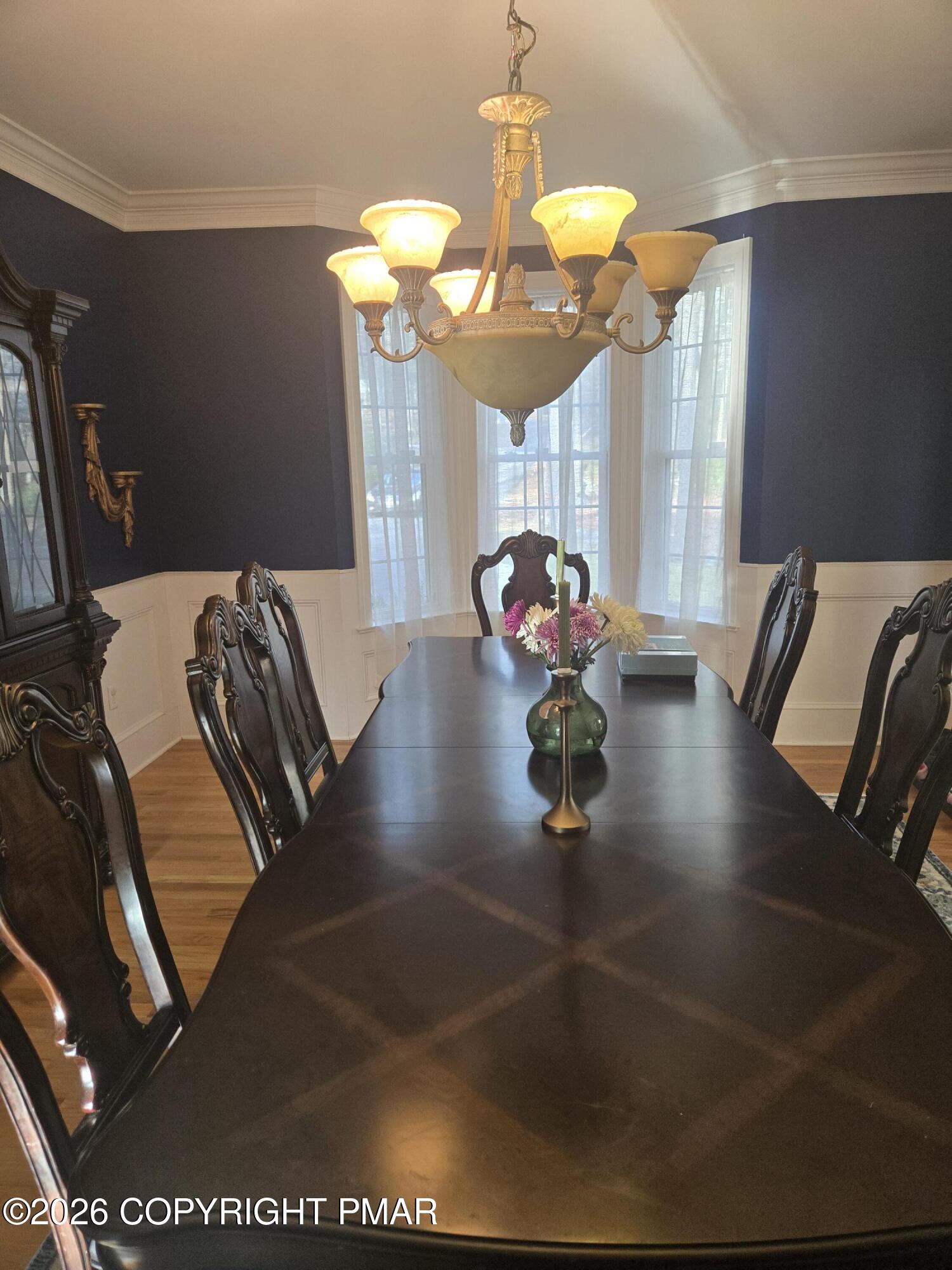 110 Crocus Lane Milford, PA 18337 - Photo 7 of 35 a view of living room with furniture and a chandelier