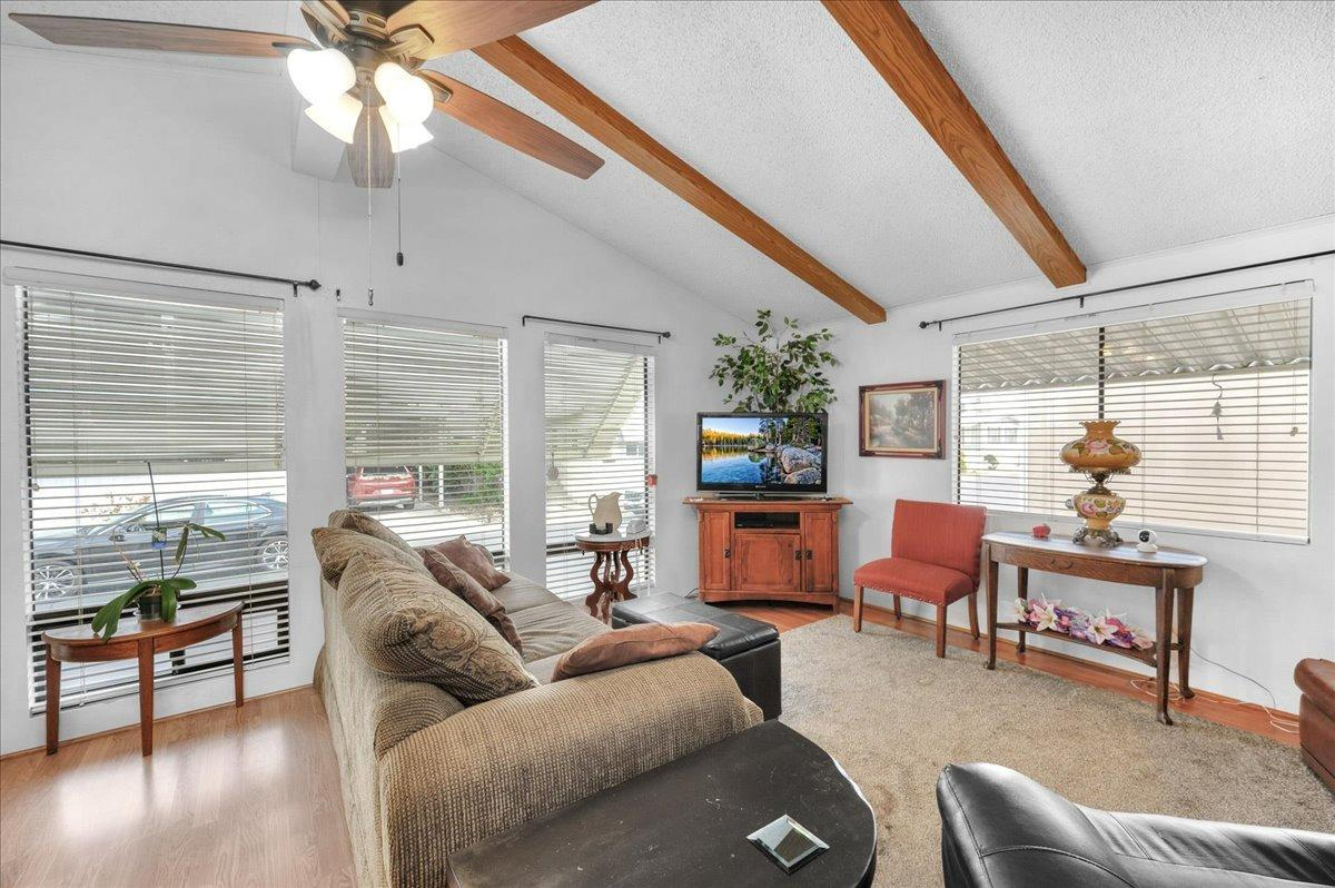 1001 Sylmar Avenue, Unit 199 Clovis, CA 93612 - Photo 12 of 50 a living room with furniture and a large window