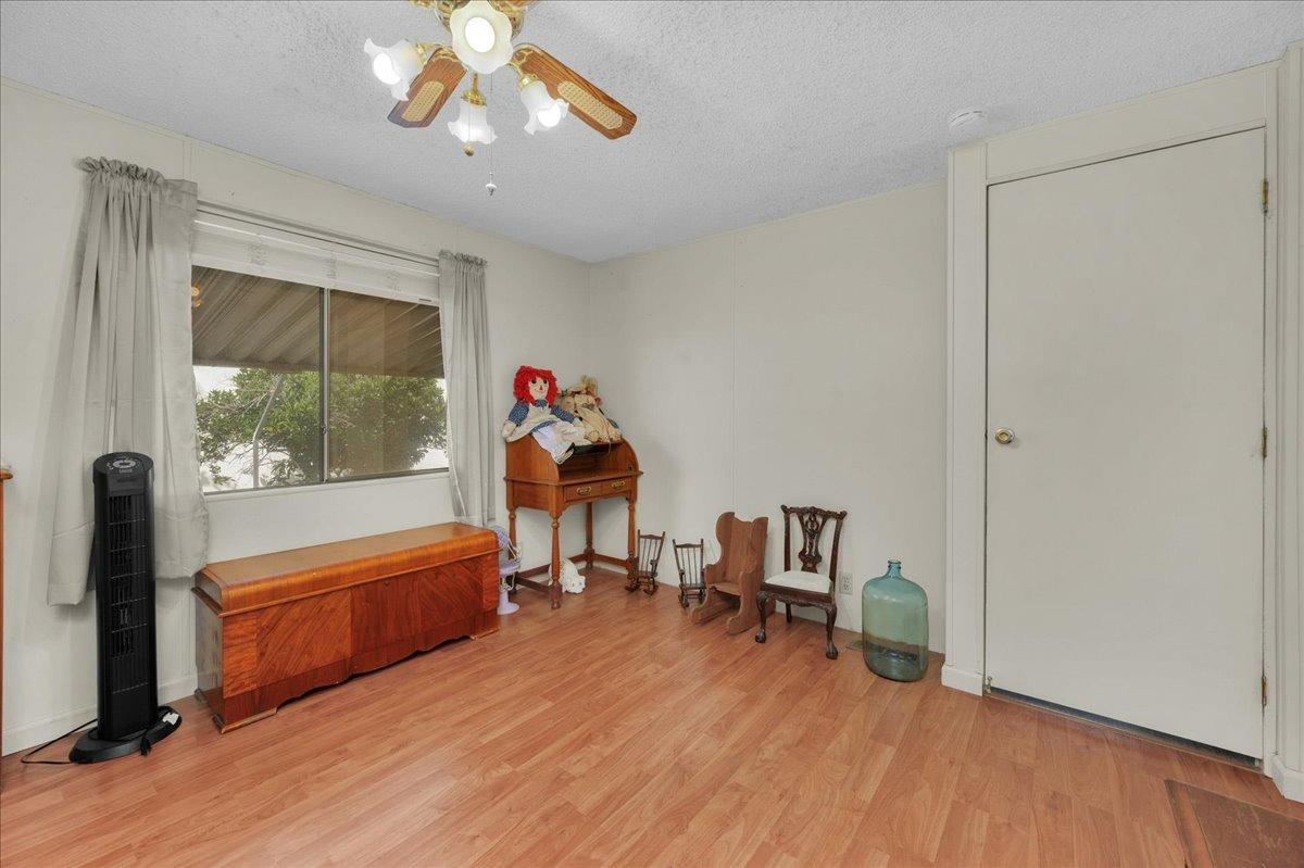 1001 Sylmar Avenue, Unit 199 Clovis, CA 93612 - Photo 15 of 50 a living room with furniture and a window