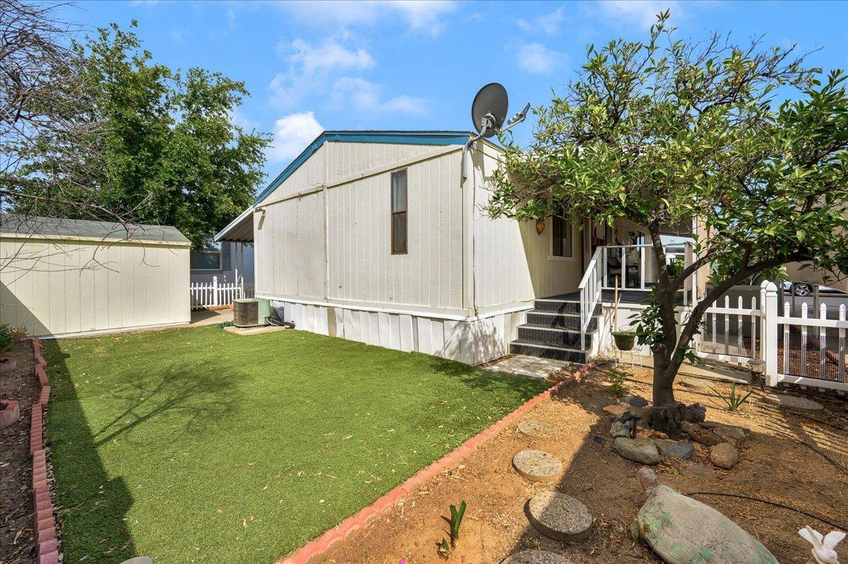 1001 Sylmar Avenue, Unit 199 Clovis, CA 93612 - Photo 25 of 50 a backyard of a house with seating space