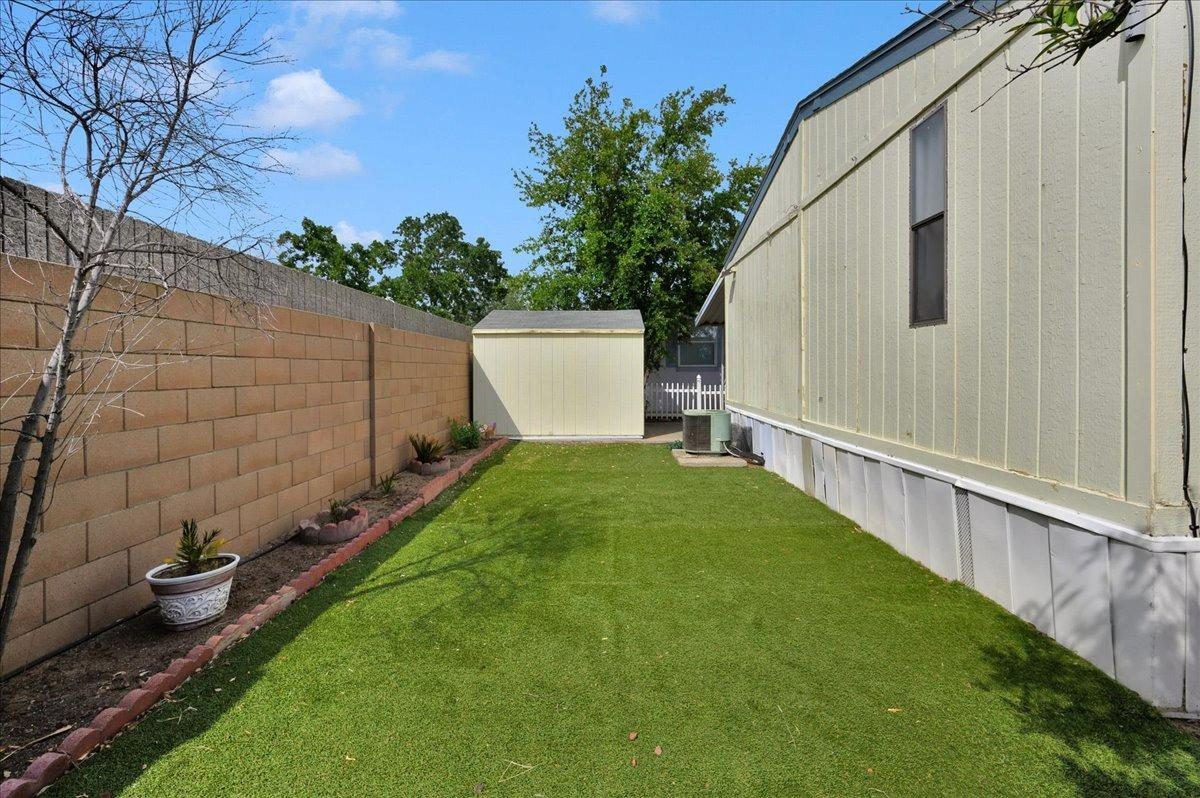 1001 Sylmar Avenue, Unit 199 Clovis, CA 93612 - Photo 27 of 50 a view of a backyard