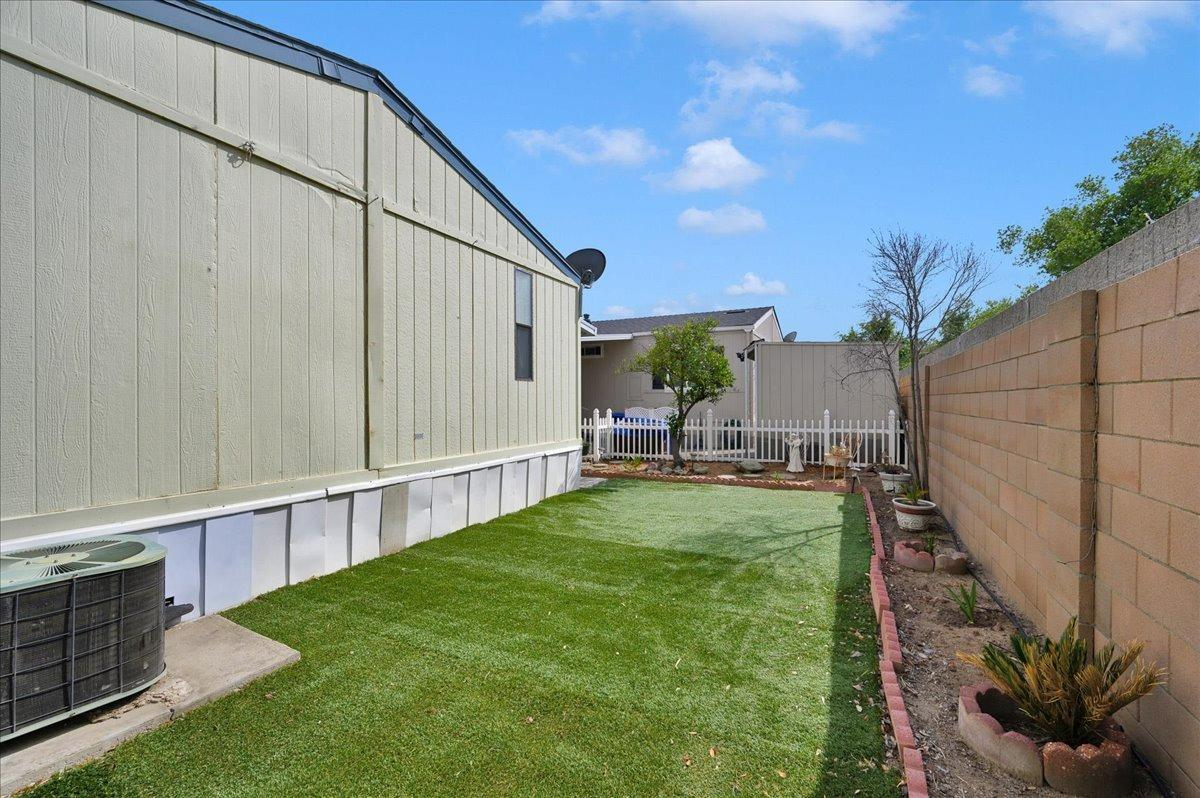 1001 Sylmar Avenue, Unit 199 Clovis, CA 93612 - Photo 29 of 50 a view of backyard with cabin