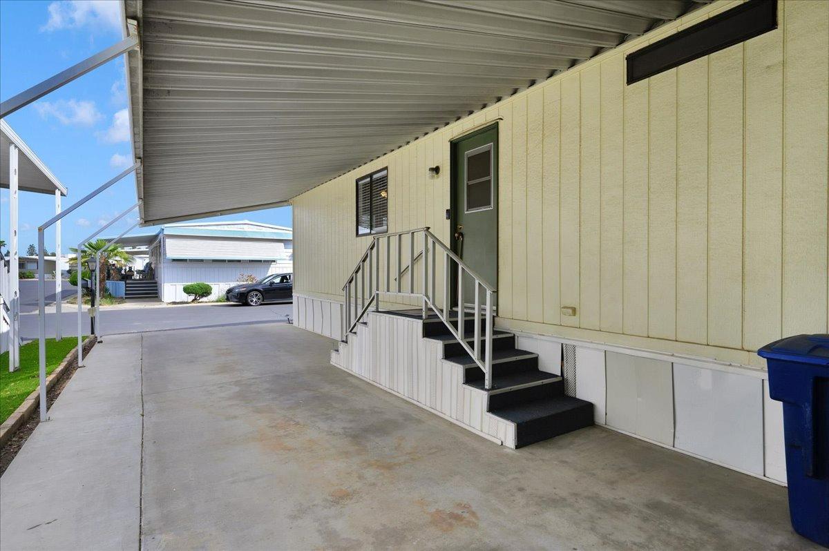 1001 Sylmar Avenue, Unit 199 Clovis, CA 93612 - Photo 31 of 50 a view of staircase with furniture and a window