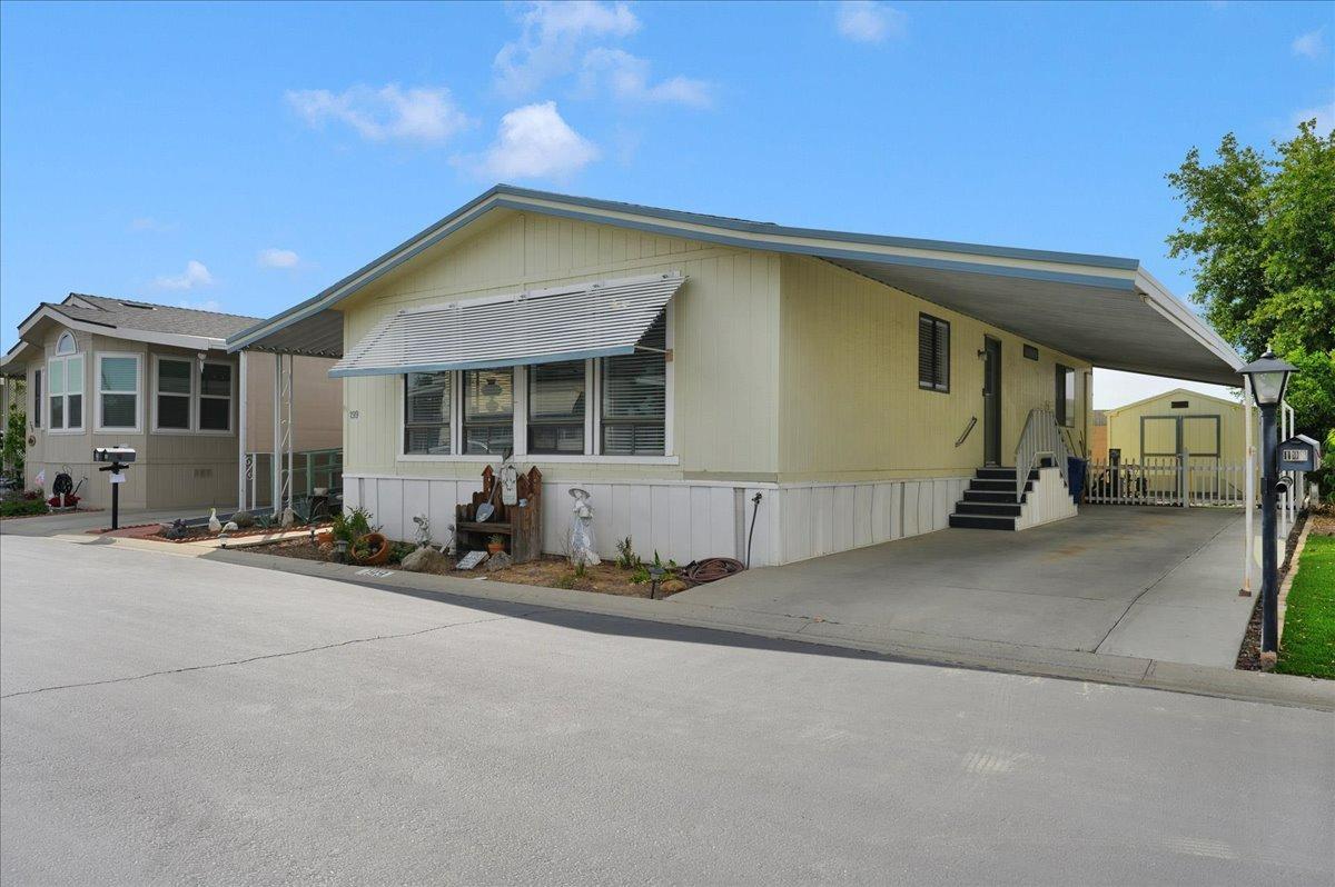 1001 Sylmar Avenue, Unit 199 Clovis, CA 93612 - Photo 35 of 50 a view of a house with patio