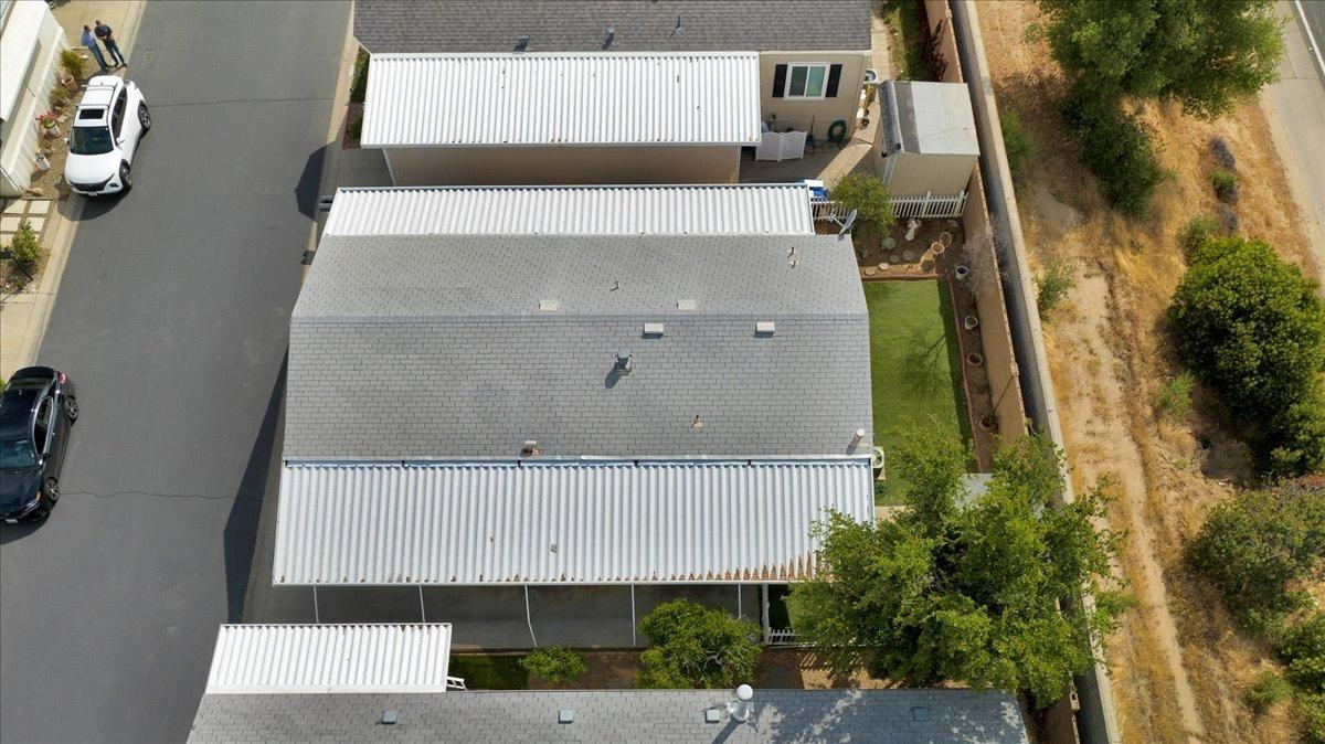 1001 Sylmar Avenue, Unit 199 Clovis, CA 93612 - Photo 40 of 50 an aerial view of a house with a yard