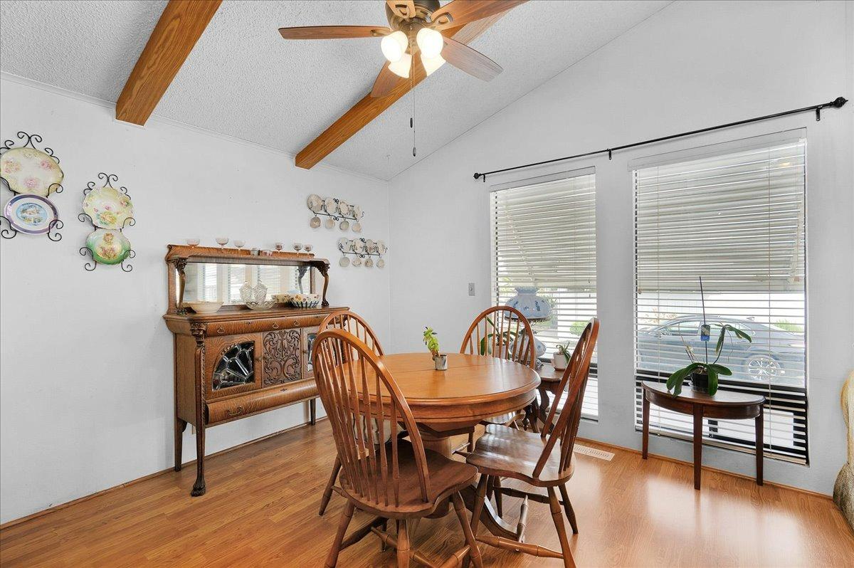 1001 Sylmar Avenue, Unit 199 Clovis, CA 93612 - Photo 4 of 50 a dining room with furniture and window