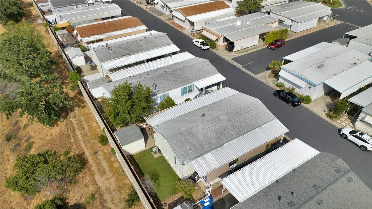 1001 Sylmar Avenue, Unit 199 Clovis, CA 93612 - Photo 41 of 50 an aerial view of residential houses with outdoor space