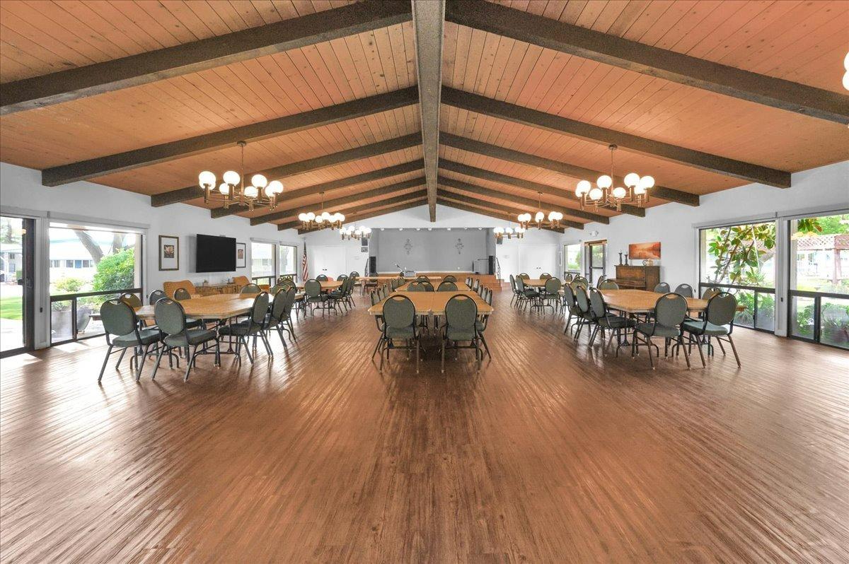 1001 Sylmar Avenue, Unit 199 Clovis, CA 93612 - Photo 46 of 50 a view of a dining room with furniture window and wooden floor
