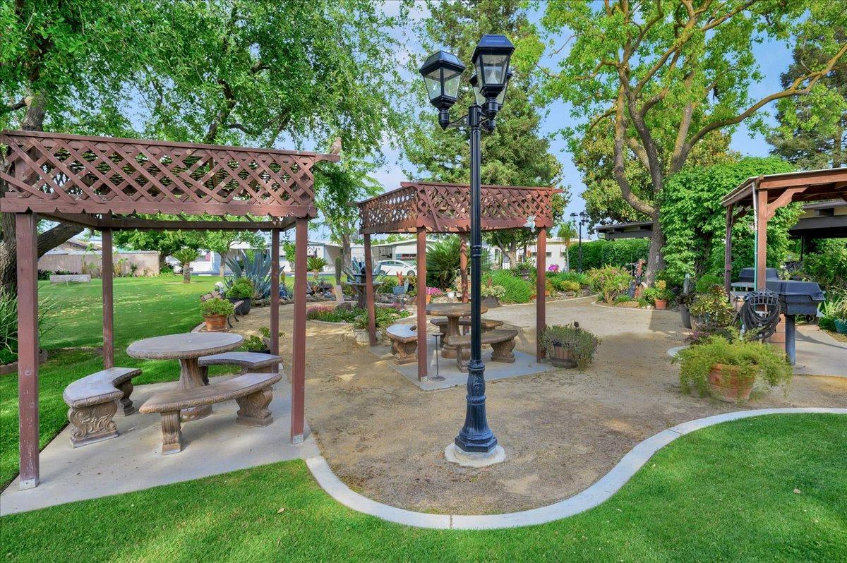 1001 Sylmar Avenue, Unit 199 Clovis, CA 93612 - Photo 48 of 50 a view of a backyard with sitting area