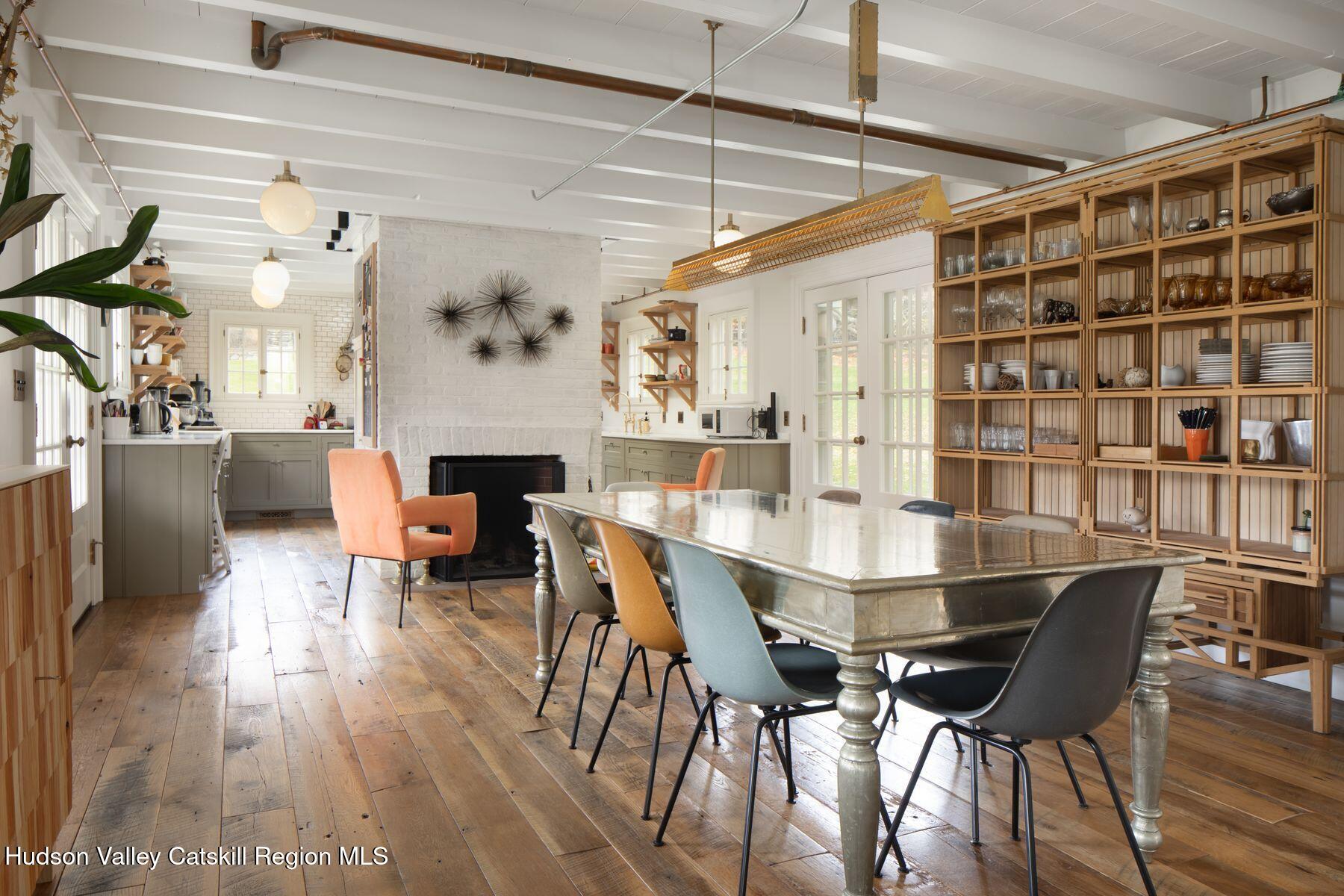2073 Highway 82 Ancram, NY 12502 - Photo 11 of 22 a view of a dining room with furniture and wooden floor