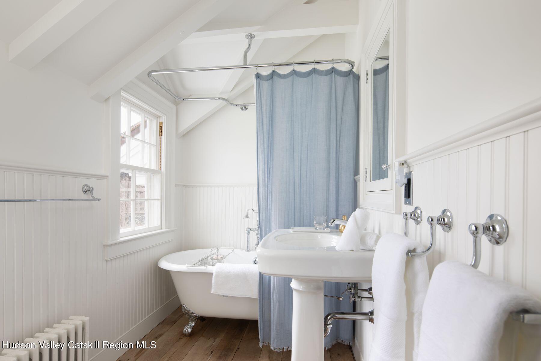 2073 Highway 82 Ancram, NY 12502 - Photo 17 of 22 a bathroom with a sink toilet and shower