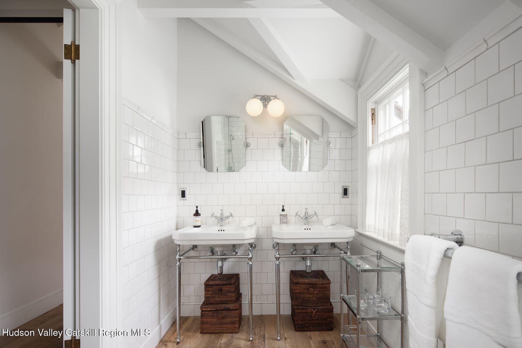 2073 Highway 82 Ancram, NY 12502 - Photo 18 of 22 a bathroom with a sink and a mirror