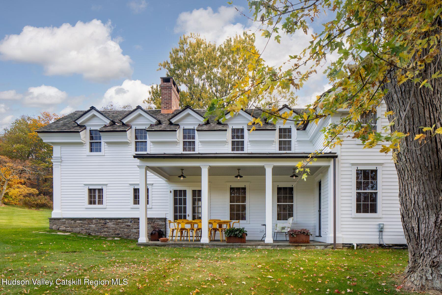 2073 Highway 82 Ancram, NY 12502 - Photo 3 of 22 front view of a house with a yard
