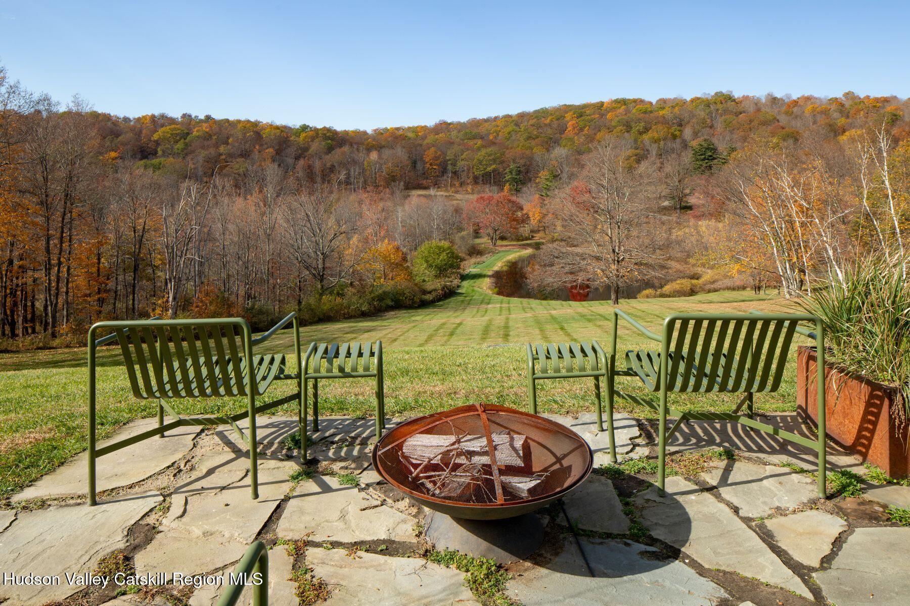 2073 Highway 82 Ancram, NY 12502 - Photo 6 of 22 a view of a chairs and a table in the patio
