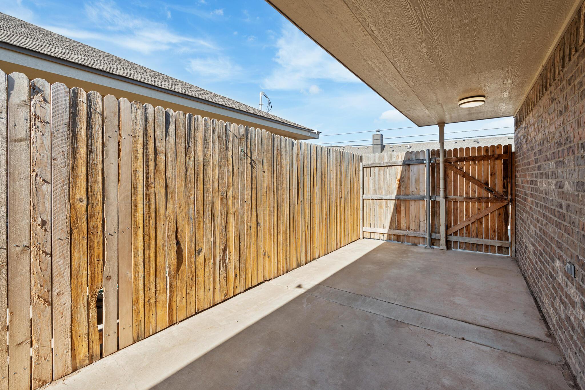 4522 Ida Louise Court Amarillo, TX 79110 - Photo 17 of 19 Side Patio