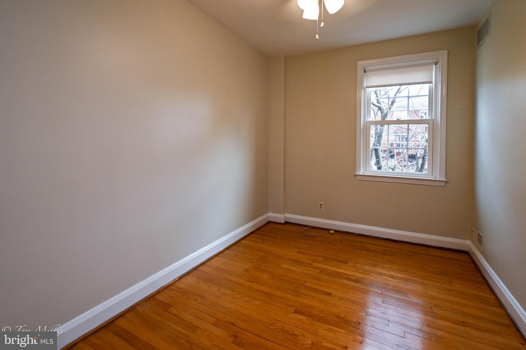127 Stanmore Road Baltimore, MD 21212 - Photo 25 of 37 Bedroom #3 (end) w/ ceilingfan &window over bckyrd