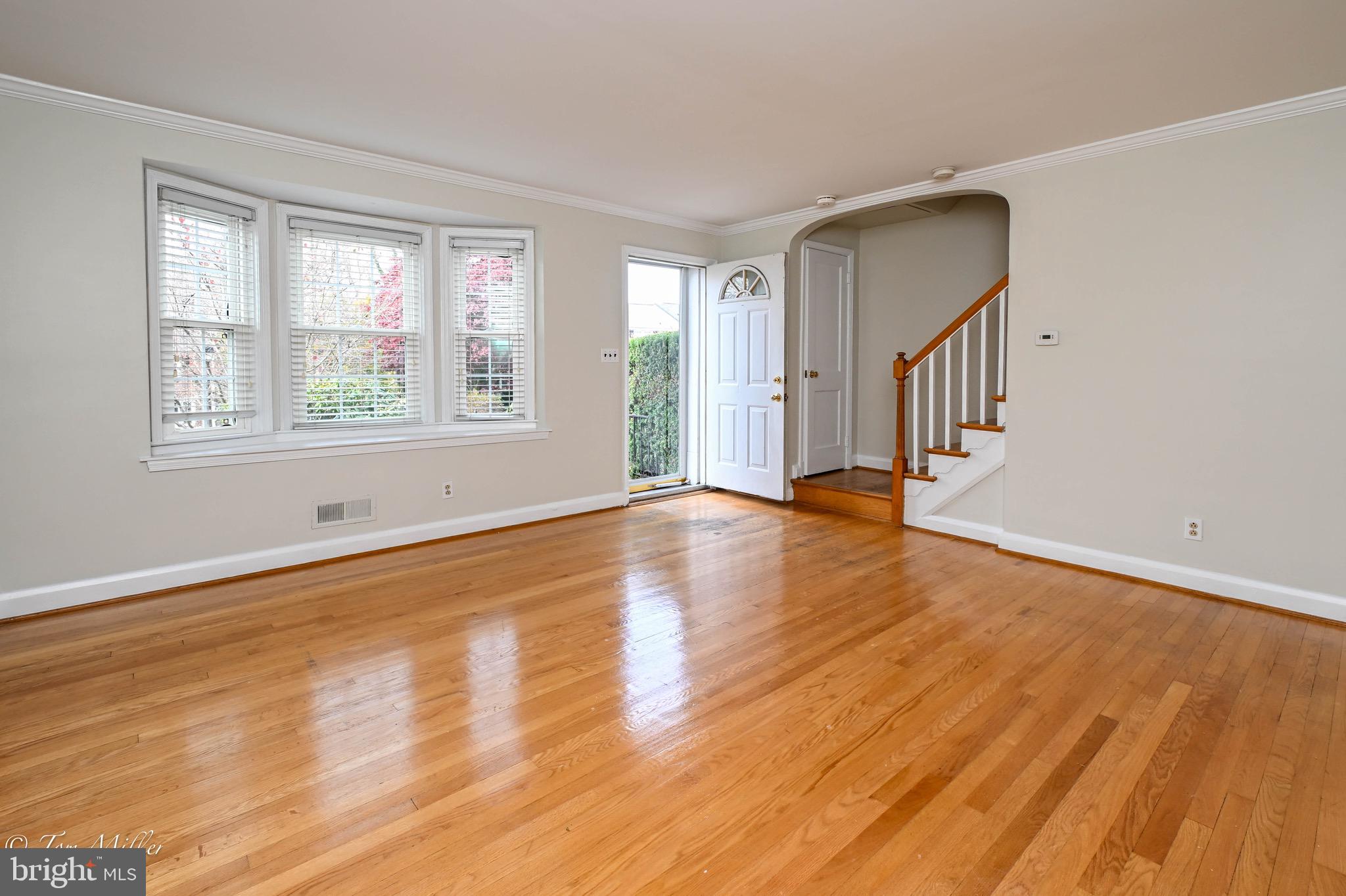 127 Stanmore Road Baltimore, MD 21212 - Photo 4 of 37 Living Room Bay Window and Front Door
