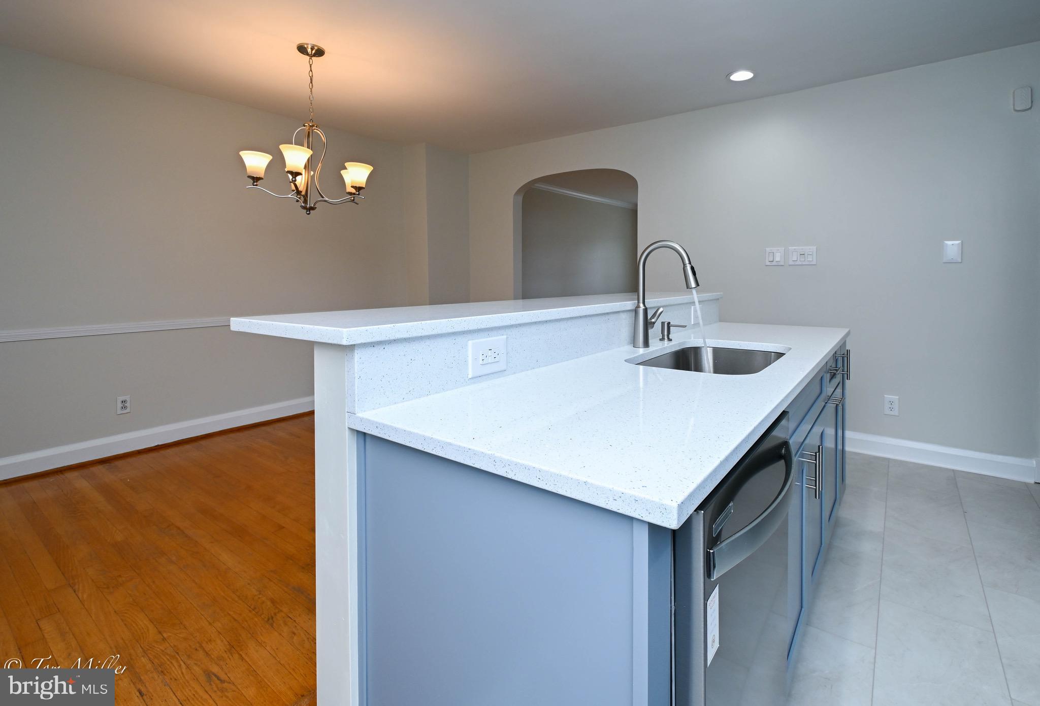 127 Stanmore Road Baltimore, MD 21212 - Photo 10 of 37 Ample Quartz Counter Space & Eat-in Island