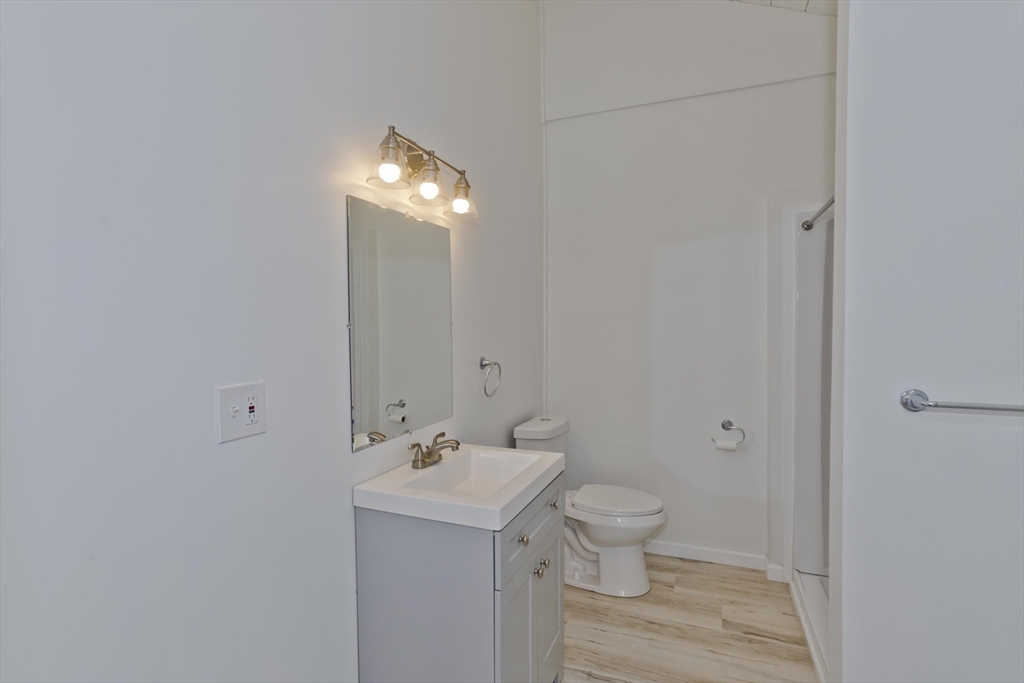 16 Knightville Dam Road Huntington, MA 01050 - Photo 12 of 40 a bathroom with a toilet sink and mirror