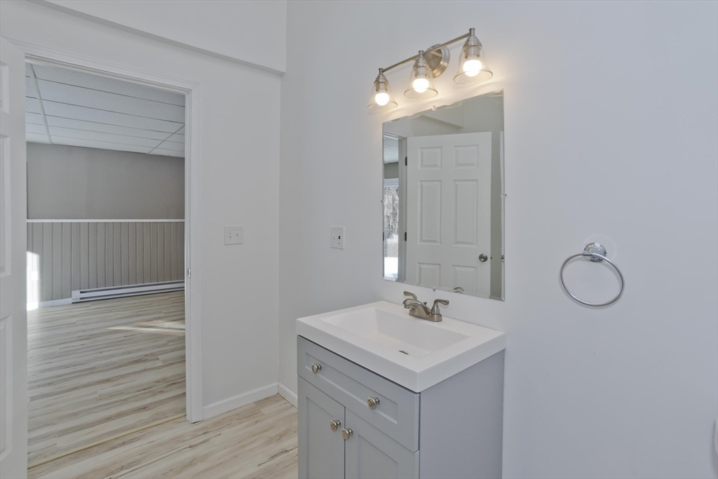 16 Knightville Dam Road Huntington, MA 01050 - Photo 25 of 40 a bathroom with a sink and a mirror