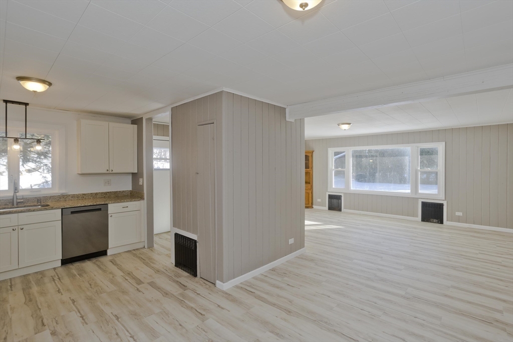 16 Knightville Dam Road Huntington, MA 01050 - Photo 7 of 40 a view of an empty room with window and wooden floor