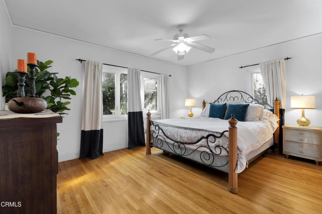 1807 Vistillas Road Altadena, CA 91001 - Photo 16 of 38 a bedroom with a bed and a potted plant