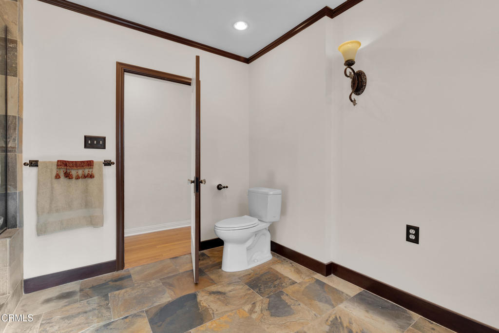 1807 Vistillas Road Altadena, CA 91001 - Photo 20 of 38 a bathroom with a toilet and a shower