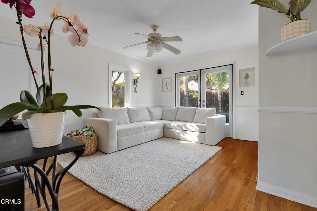 1807 Vistillas Road Altadena, CA 91001 - Photo 22 of 38 a living room with furniture and a chandelier