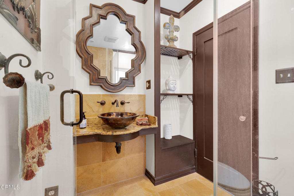 1807 Vistillas Road Altadena, CA 91001 - Photo 25 of 38 a bathroom with a sink and mirror