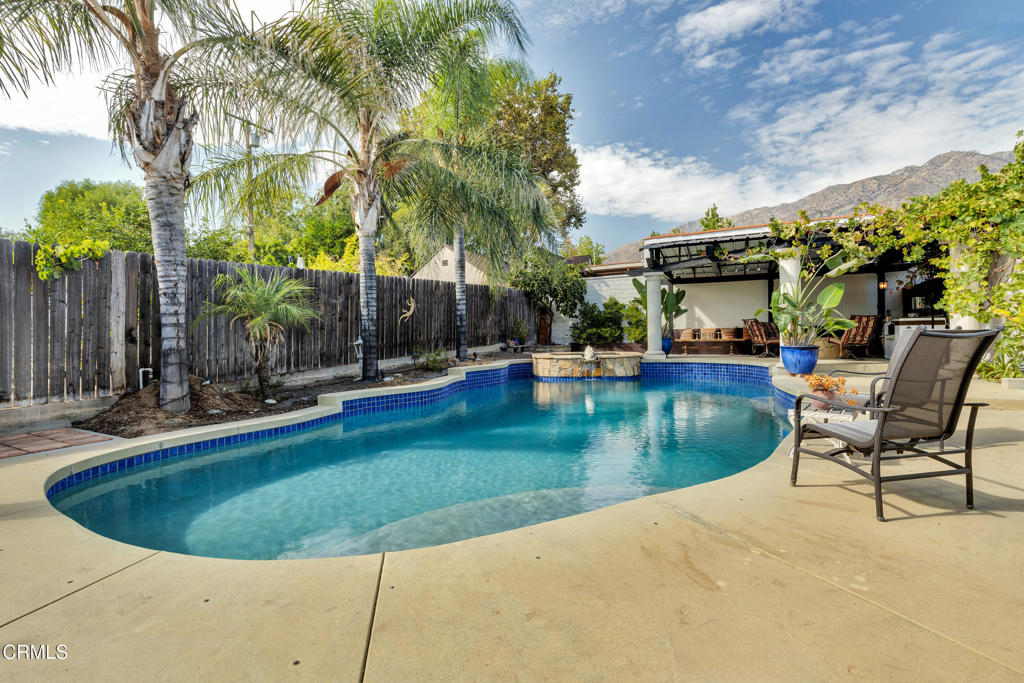 1807 Vistillas Road Altadena, CA 91001 - Photo 27 of 38 a view of a swimming pool with a seating space