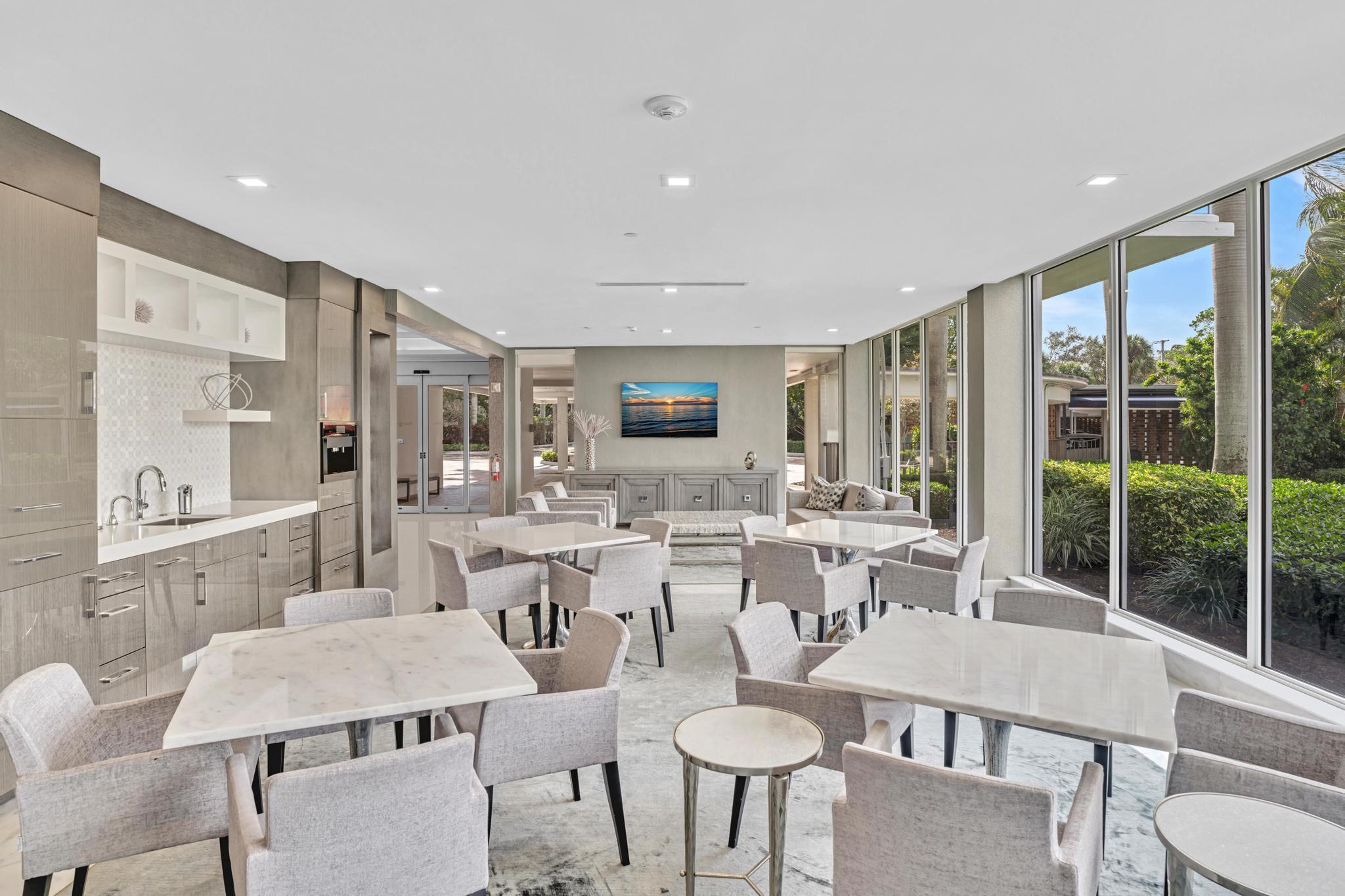 701 East Camino Real, Unit 12G Boca Raton, FL 33432 - Photo 38 of 82 a view of a dining room with furniture window and outside view