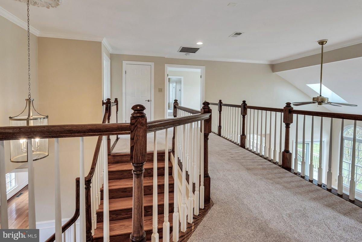 17001 Spates Hill Road Poolesville, MD 20837 - Photo 18 of 30 Dramatic stairwell and new carpet throughout!