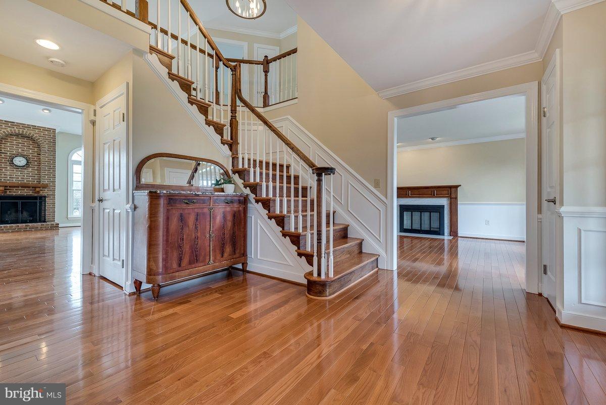 17001 Spates Hill Road Poolesville, MD 20837 - Photo 3 of 30 Rich hardwoods and a sweeping stairway in foyer