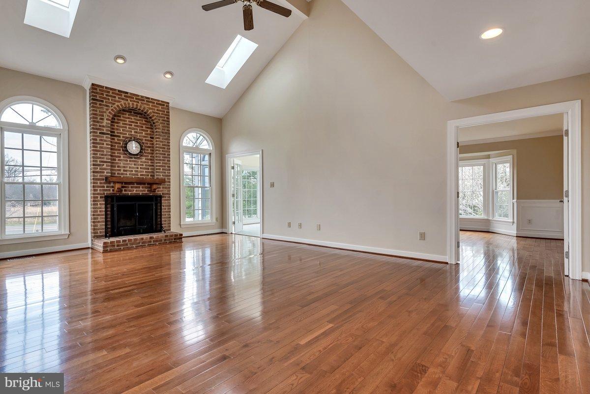17001 Spates Hill Road Poolesville, MD 20837 - Photo 9 of 30 WOW! Floor-to-ceiling wood-burning fireplace!