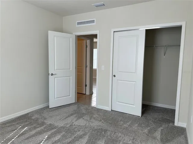 an empty room with closet