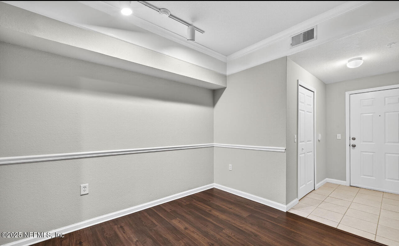 8550 Touchton Road, Unit 911 Jacksonville, FL 32216 - Photo 6 of 8 Entry Foyer and Dining Space