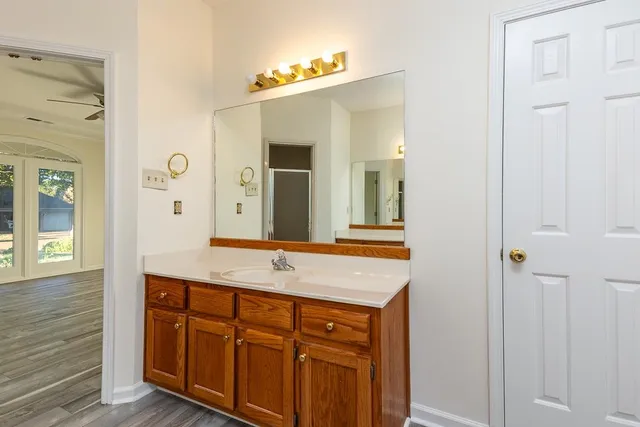 a bathroom with a sink and a mirror