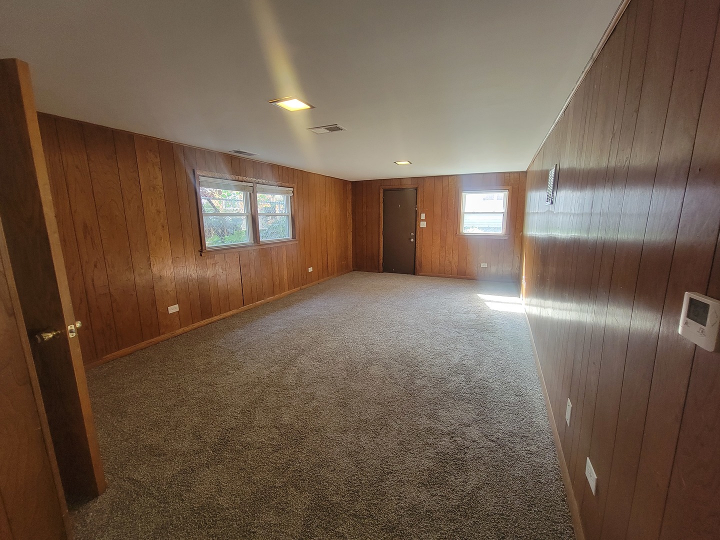 5237 West Roscoe Street Chicago, IL 60641 - Photo 17 of 27 en empty room with windows