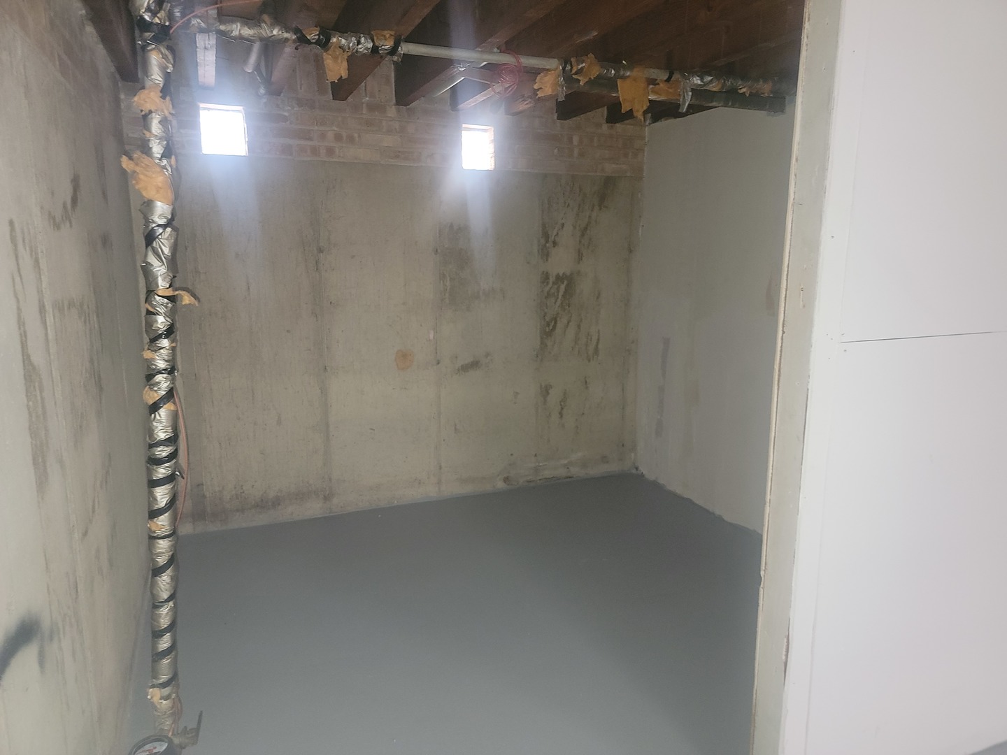 5237 West Roscoe Street Chicago, IL 60641 - Photo 21 of 27 a view of a room with empty racks