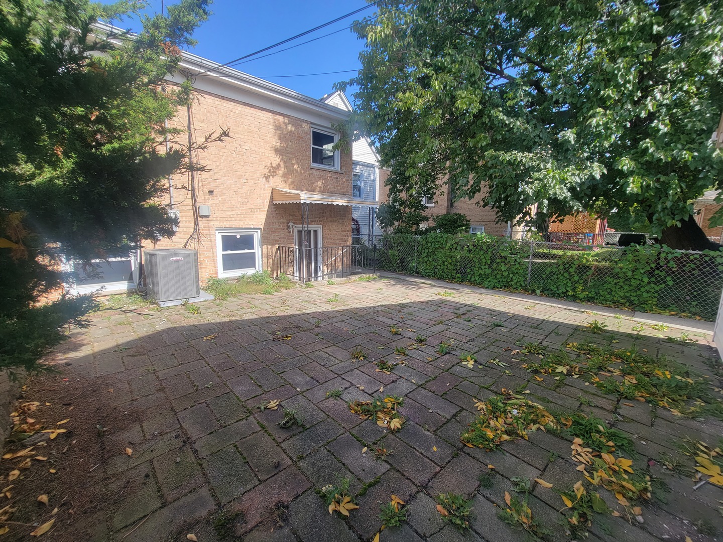5237 West Roscoe Street Chicago, IL 60641 - Photo 26 of 27 a view of a house with a street