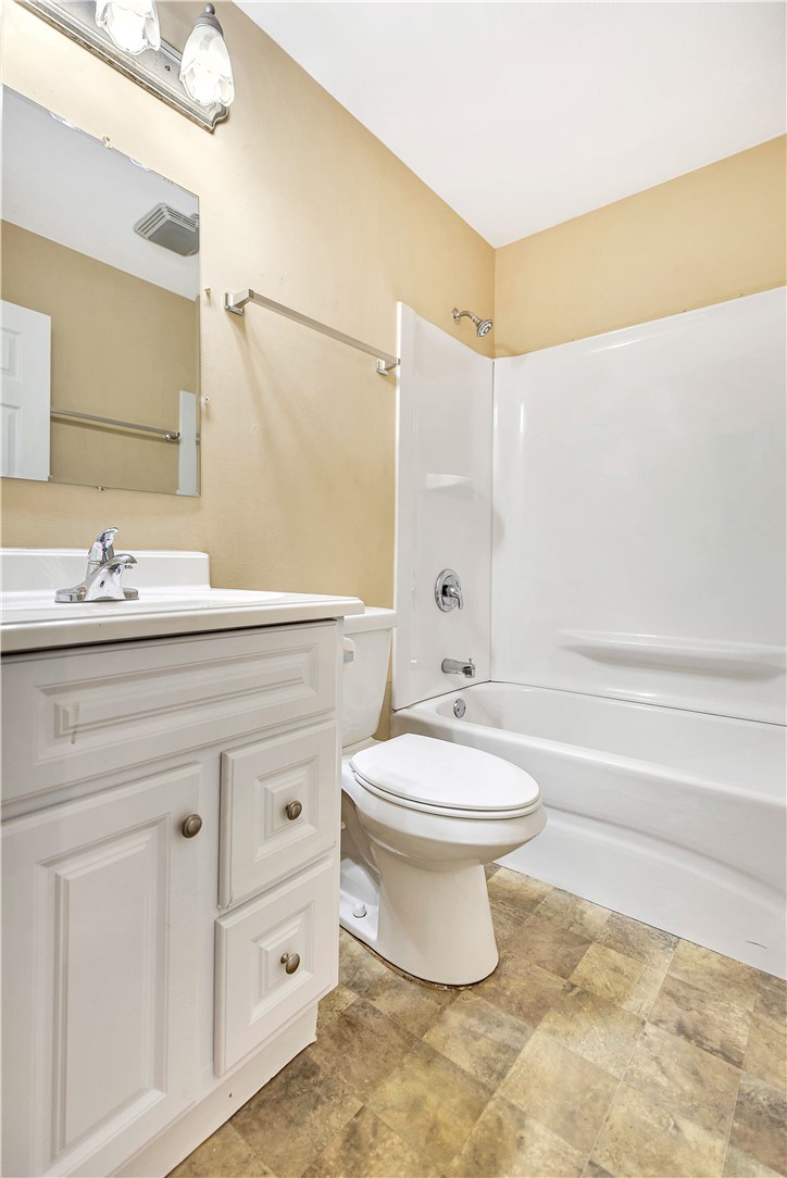 2011 Forest Drive Seneca, SC 29672 - Photo 23 of 36 Functional full bathroom featuring a white vanity with ample storage and a classic tub-shower combination.